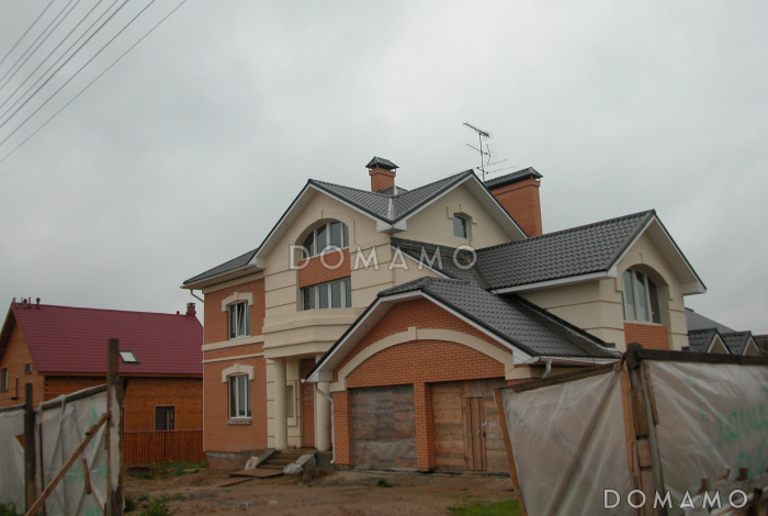 Проект импозантного особняка с гаражом на две машины, бассейном и тренажерным залом