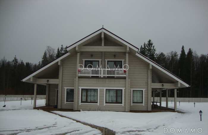 Проект дома из клееного бруса с несложными фасадами