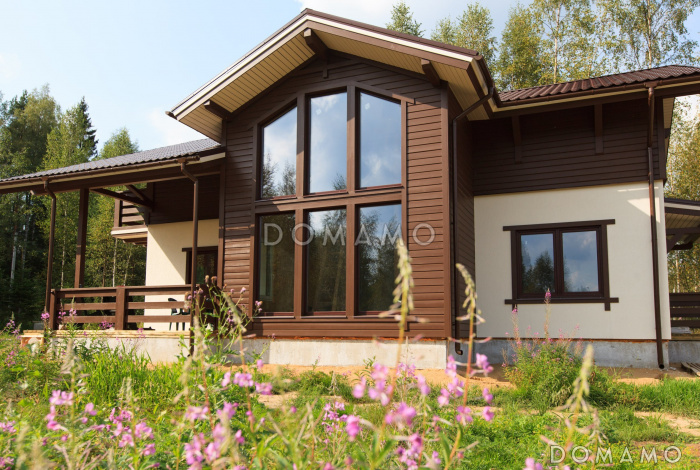 Проект современного каркасного дома с двумя террасами