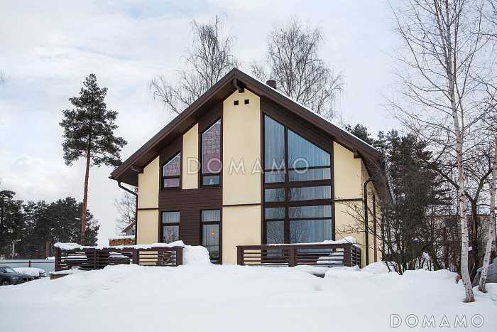 Проект каркасного дома с террасой, мансардой и вторым светом