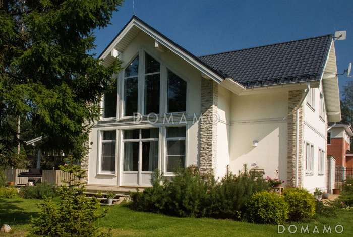 Проект каркасного дома с навесом для машины