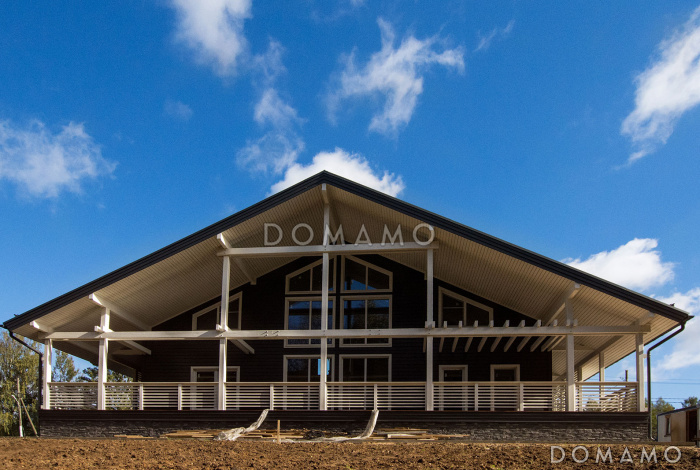 Проект дома из пеноблоков в стиле шале с сауной