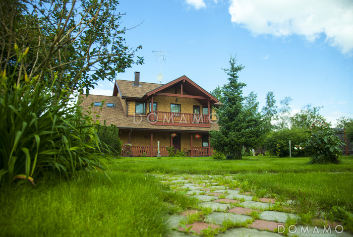 Проект комфортабельного каркасного дома с просторной кухней и вторым светом