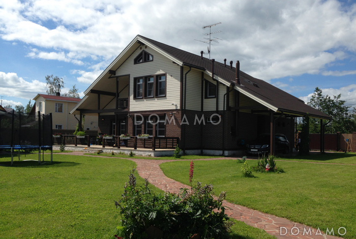 Проект каркасного дома с отделкой из двух материалов