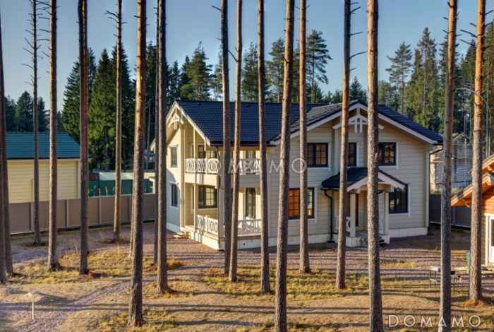 Проект двухэтажного дома из клееного бруса с пятью спальнями