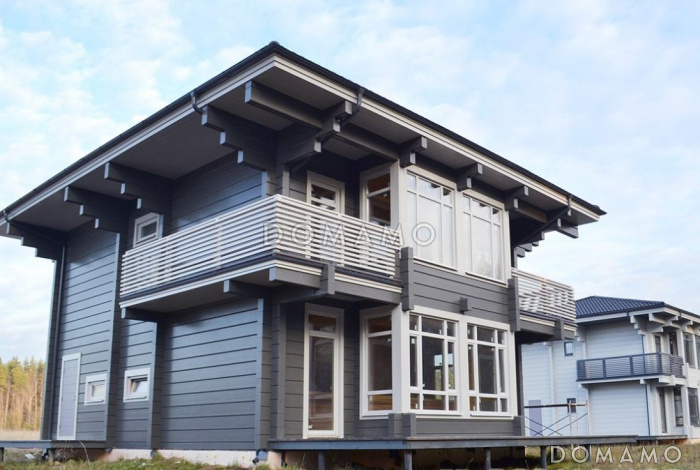 Проект дома из клееного бруса с тремя спальнями на втором этаже