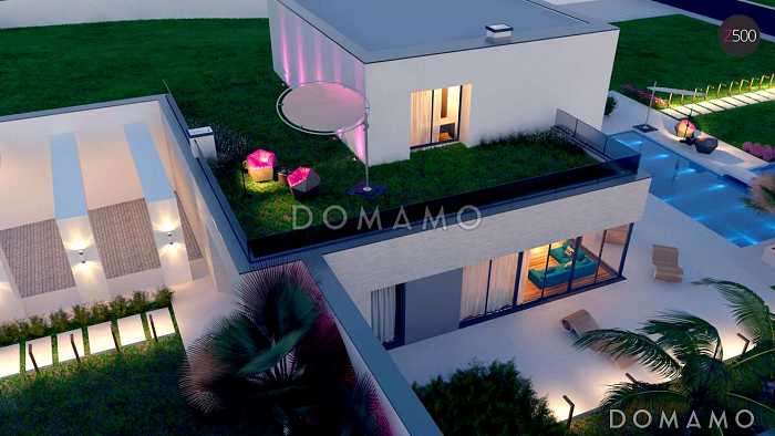 Проект современного двухэтажного дома из кирпича с плоской крышей необычного дизайна, с большими террасами на обоих уровнях, подходит для участка со склоном