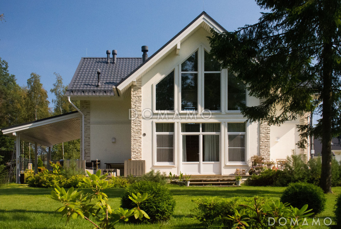 Проект каркасного дома с навесом для машины